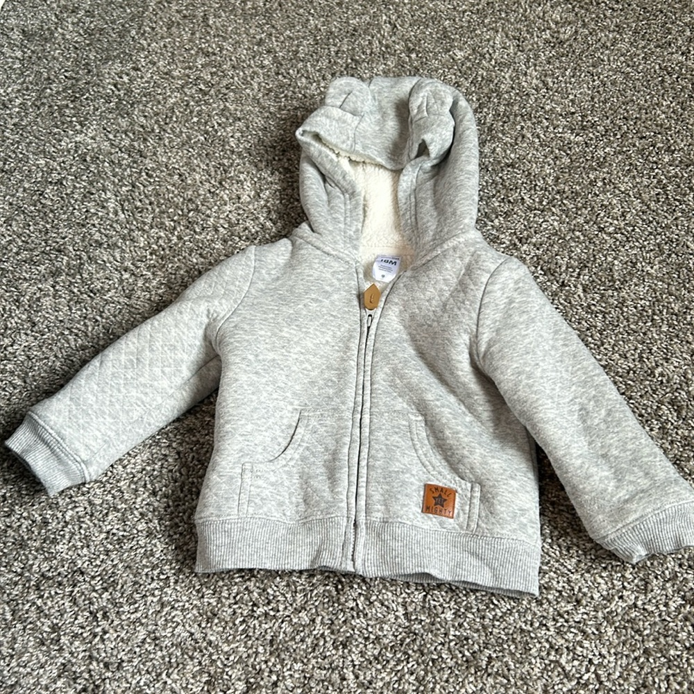 Zip up light gray hoodie from Carter’s 18 months toddler boys. Ear detailed hood